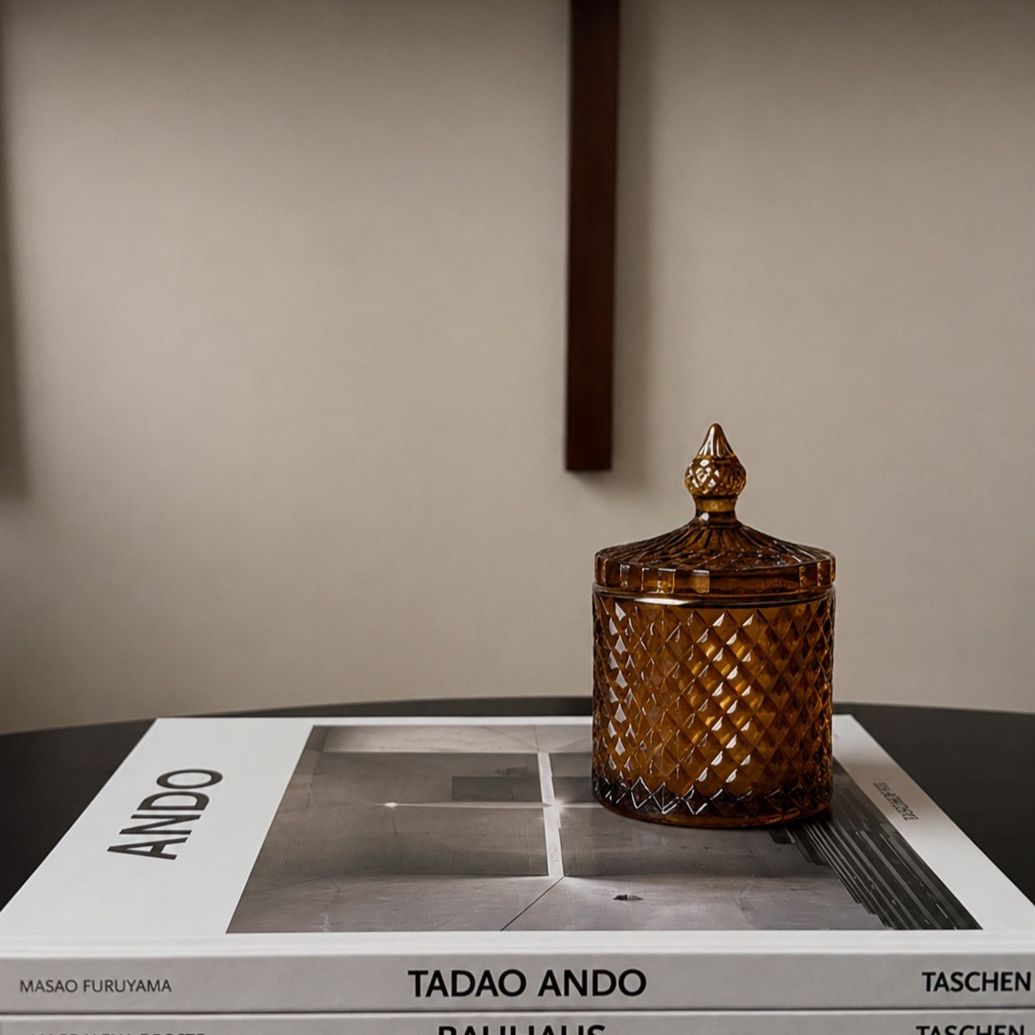 Cut glass. A finial lid. A silhouette that looks like it belongs in a design archive, not a candle aisle.
This is what happens when packaging stops chasing trends and starts chasing permanence.

Our amber cut-glass candle jar with sculpted finial lid is the kind of product that does not compete on shelf, it owns the shelf. The diamond-faceted texture catches light from every angle.

 The lid alone could pass as a standalone objet d'art. And the deep amber tone reads as warm, rich and unmistakably premium, whether it is sitting next to a coffee table book or styled into a luxury retail display.
This is not a candle jar. It is a design decision.

Introducing the Alchemy Art Studio Cut Glass Heritage Collection.
Built for retailers, hospitality brands and gifting curators who know that the right vessel does not just hold a fragrance, it elevates the entire space around it.

Diamond-cut texture, premium tactile and visual appeal that justifies higher retail pricing.
Reusable vessel design, customers keep it long after the candle is gone, extending brand recall.
Custom colours and finishes available, amber, smoke, clear and bespoke tones on request.
Custom branding available, your label or embossing on a vessel this distinctive.
MOQ 500 units, scalable across colours, sizes and finishes.
Worldwide export ready, serving buyers across the US, UK, Europe, Middle East, Australia and beyond.
Private label available for brands ready to scale

Heritage design never goes out of season. This is the kind of piece that performs year-round, not just during festive windows, making it a smart, steady addition to any retail or hospitality range.

DM us or comment CUTGLASS below to receive our heritage collection catalogue, finish guide and international wholesale pricing sheet.
Crafting Premium. Exporting Worldwide.

#CutGlassCandles #LuxuryCandleVessels #WholesaleCandleSupplier #PrivateLabelCandles #GlobalCandleExporter