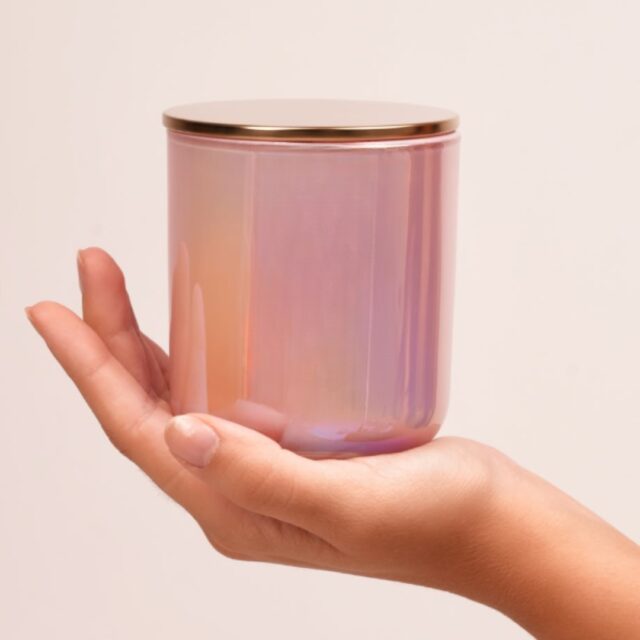 Our Pearl Iridescent Glass Candle Jar with Gold Lid shifts from blush to lavender to warm rose gold depending on the angle, the light, and the moment. 

No two photographs of this jar look identical. No two customers experience it the same way.
And that is precisely why it sells itself.
In a market where every candle brand is fighting for a three-second scroll stop, this vessel does not fight. It simply holds the light differently from everything around it, and lets that do the work.

The gold lid is not an afterthought. It is a full stop. A deliberate finish that takes an already extraordinary vessel and closes it with the confidence of something that knows its own worth.

This is the jar your customers pick up to show someone else in the store.
This is the jar that ends up in an unboxing video without being asked.
This is the jar that makes your brand look like it spent twice the budget it actually did.

Your customers are not just buying a candle. They are buying a feeling they want to photograph, share and gift again.
Give them the vessel that makes that easy.

Crafting Premium. Exporting Worldwide.

#IridescentCandles #PearlGlassJar #WholesaleCandleSupplier #PrivateLabelCandles #GlobalCandleExporter